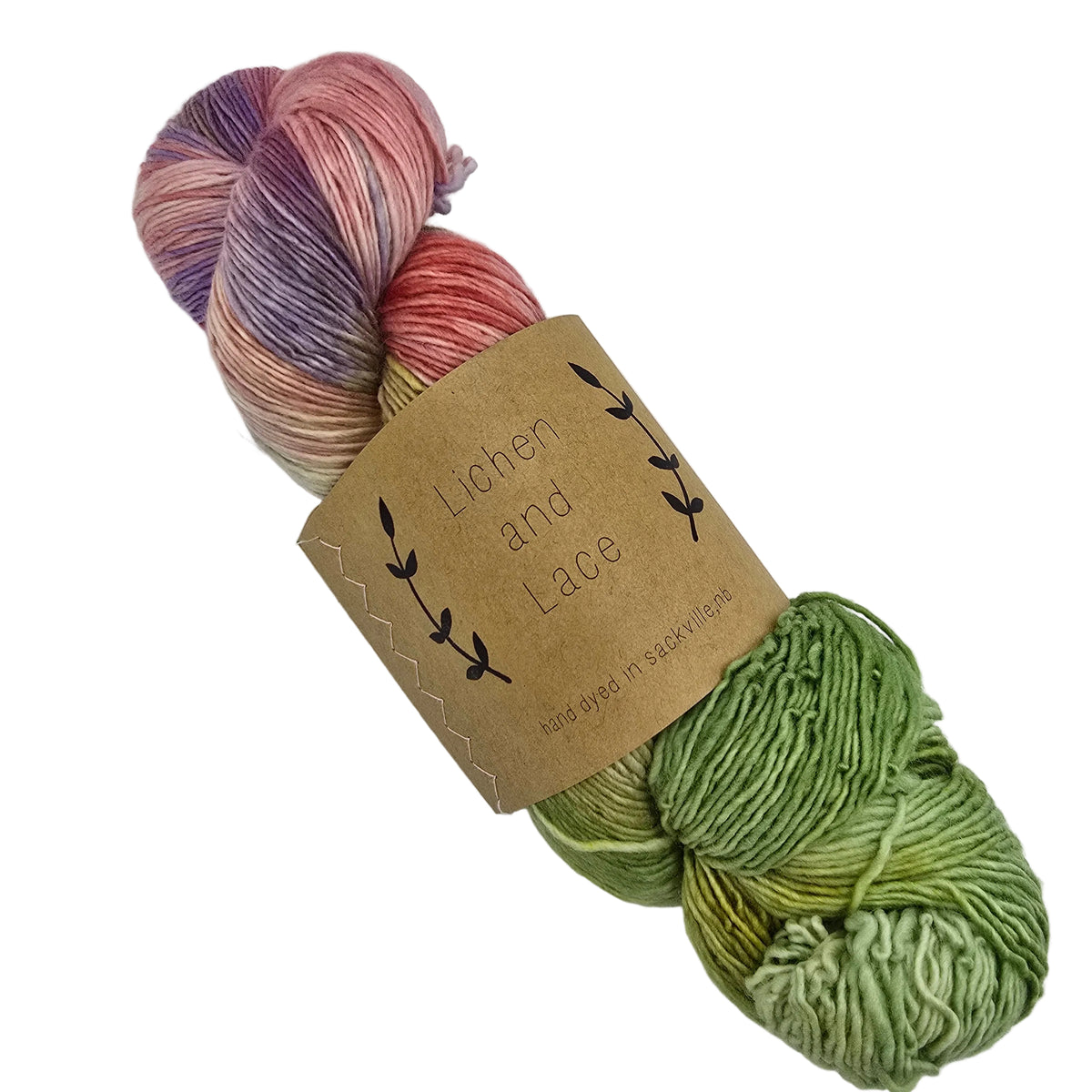 A skein of 1_Ply_Superwash_Merino_Fingering_Yarnby_Lichen_Lace in the color Wildflower a variegated yarn featureing blended shades of green, pink, purple, and orange, photographed on a plain white background.