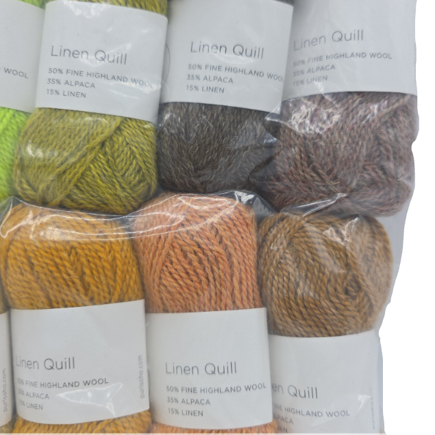 Close-up Image of a set of mini skeins of Purl Soho Linen Quill Yarn Set of 10 Minis in Citrus & Brown colors with labels on a white background.