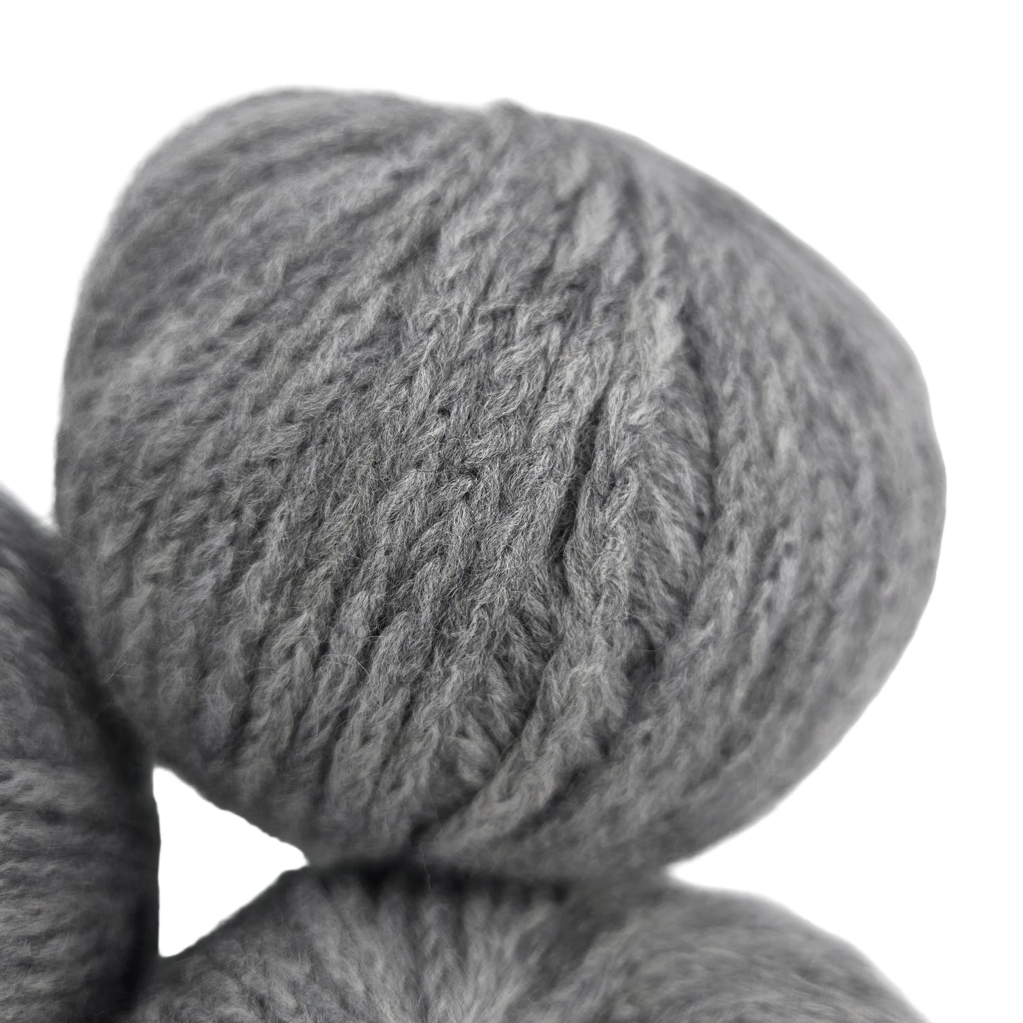 Close-up image of Catena_by_Berroco yarn in Color_5409_Tourmaline on a white background.
