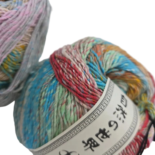 Close-up image of Haruito by Noro yarn in Color 15 with partial label on a white background.