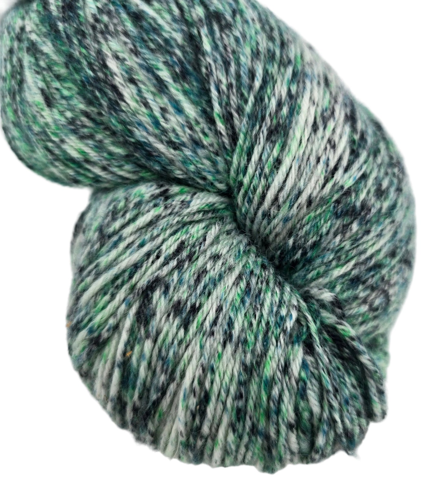 Close-up image of Muse Hand Painted Sock Yarn by Knit Picks in the color Dedication Speckle 28799 on a white background.