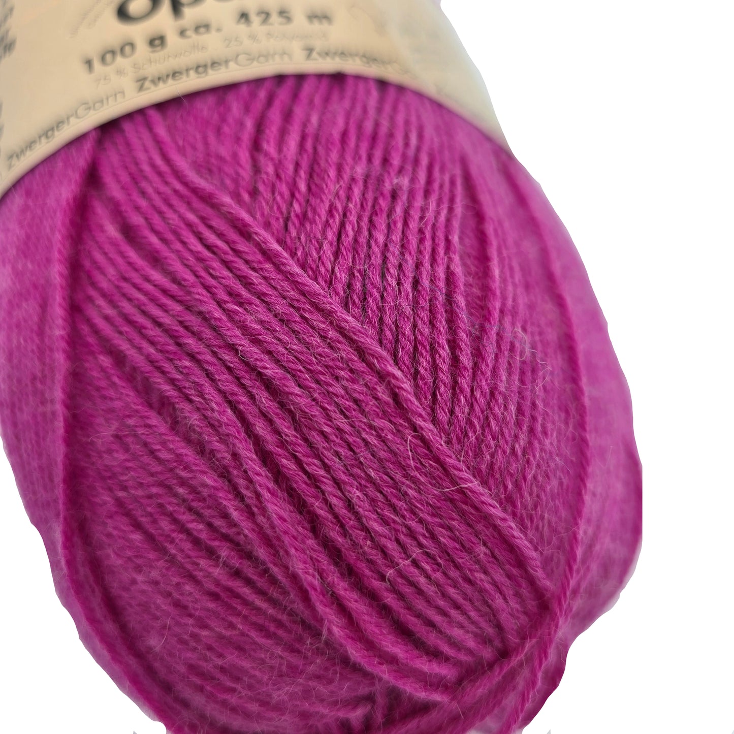 Close-up image of Opal Uni Solid 4-Ply Yarn by Opal in Color 15 with partial label on a white background.