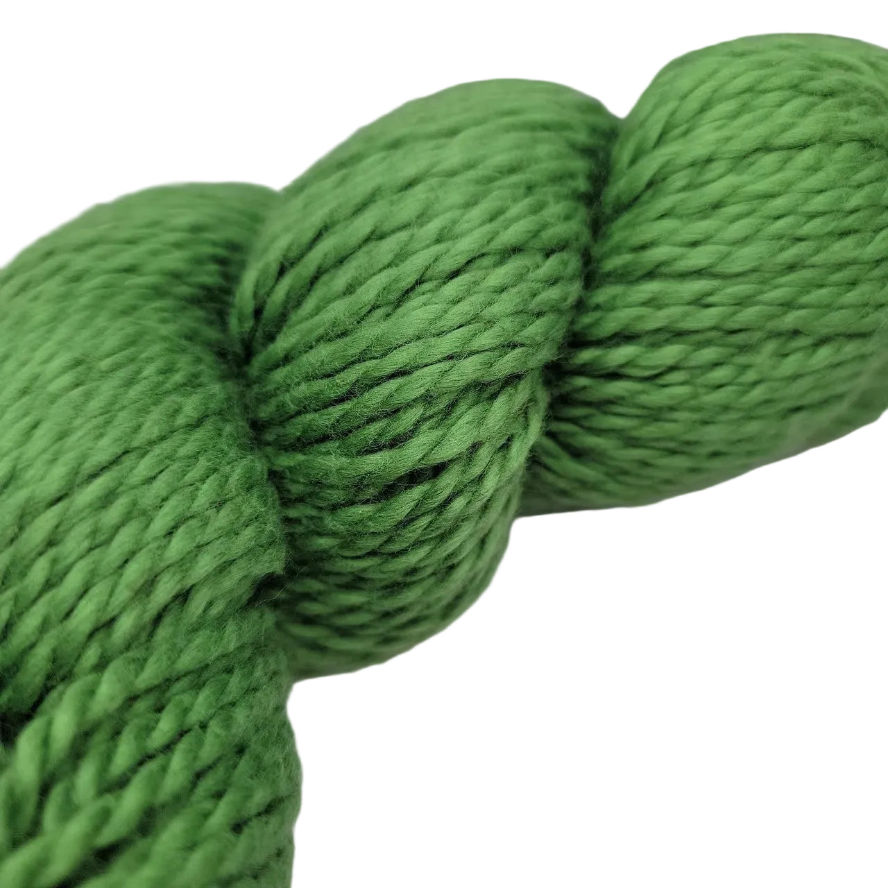 Close-up image of Organic Cotton Worsted by Blue Sky Fibers Yarn in the color Pickle 633 on a white background.