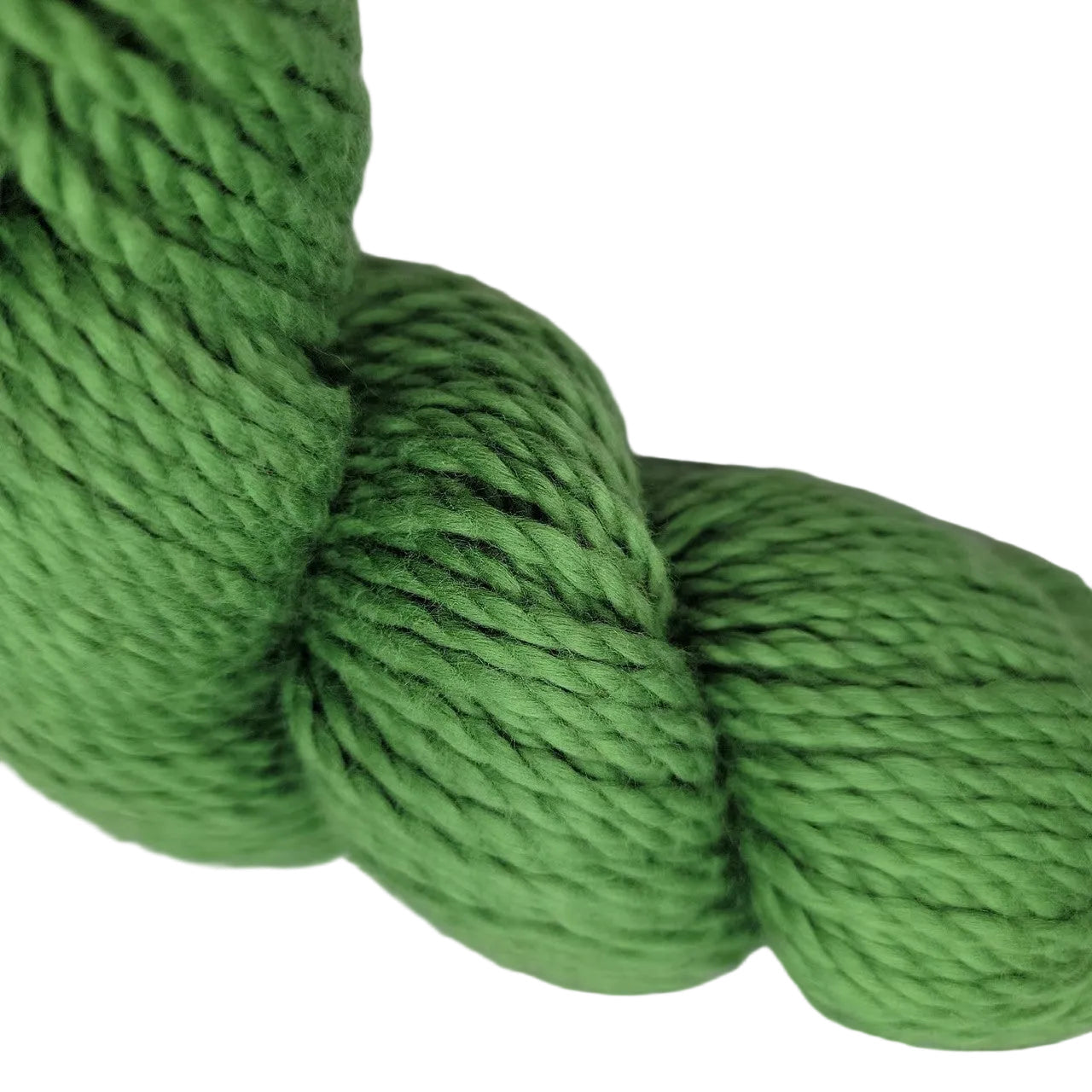 Close-up image of Organic Cotton Worsted by Blue Sky Fibers Yarn in the color Pickle 633 on a white background.