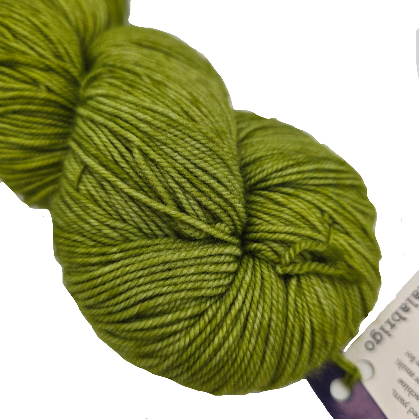Close-up image of Sock by Malabrigo yarn in color 037 Lettuce with partial label on a white background.