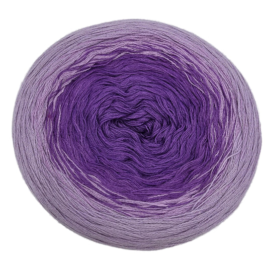 Image from above a single cake of Sultan_Gradient_yarn by_Cotton_Kings_Hobbii_-_Color_06_Amethyst on a white background.