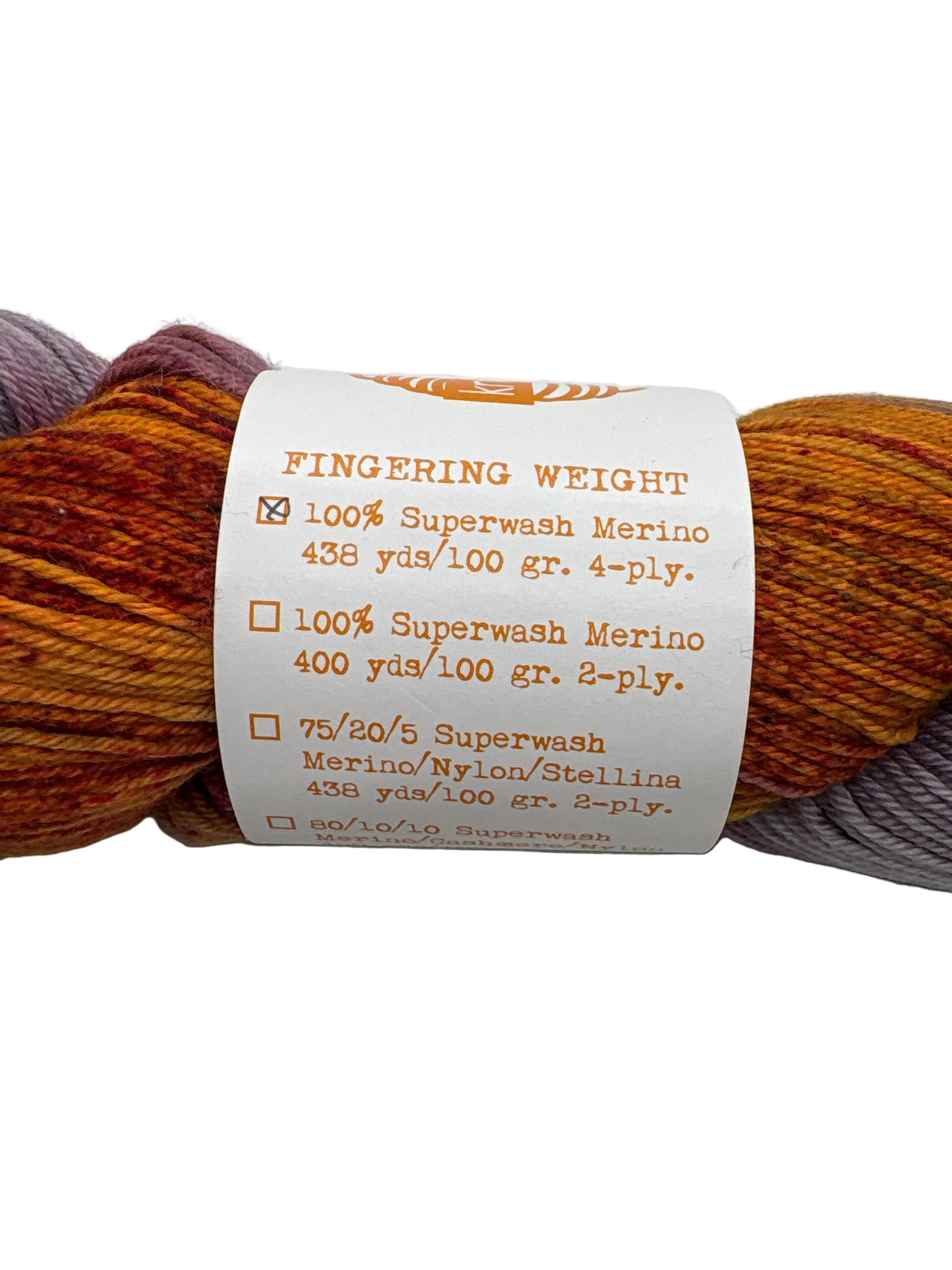 Close-up image of label on a skein of 4-ply Fingering 100% superwash merino wool yarn by Knerd String.