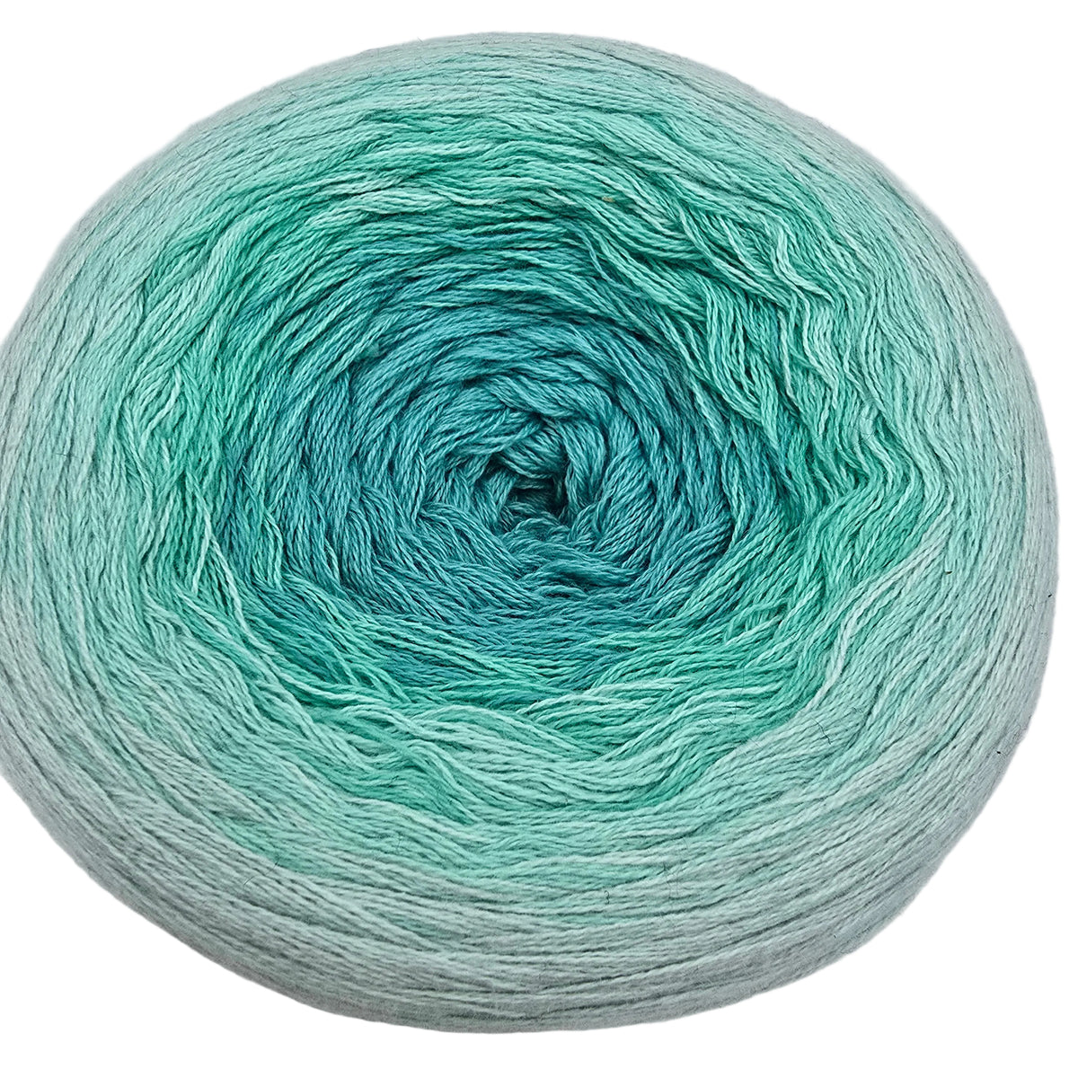 Image of a single cake of Cotton_Kings_Twirls_yarn by_Hobbii_in color_07 Emerald on a white background.