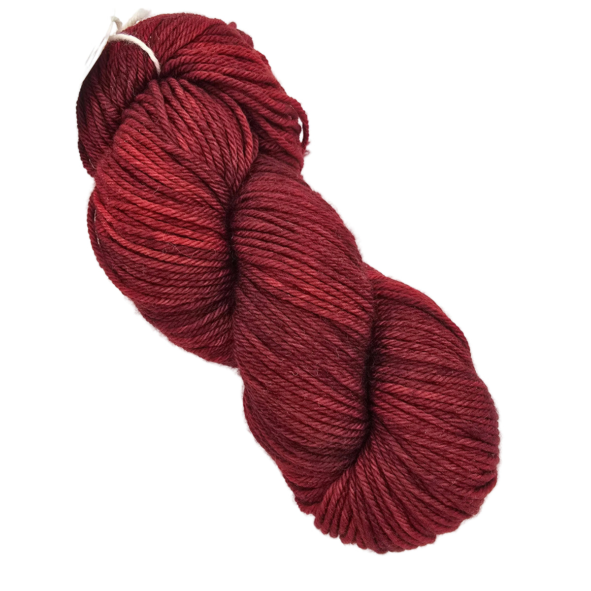 A skein of deep burgundy yarn with a visible color-shading effect, photographed on a clean white background.
