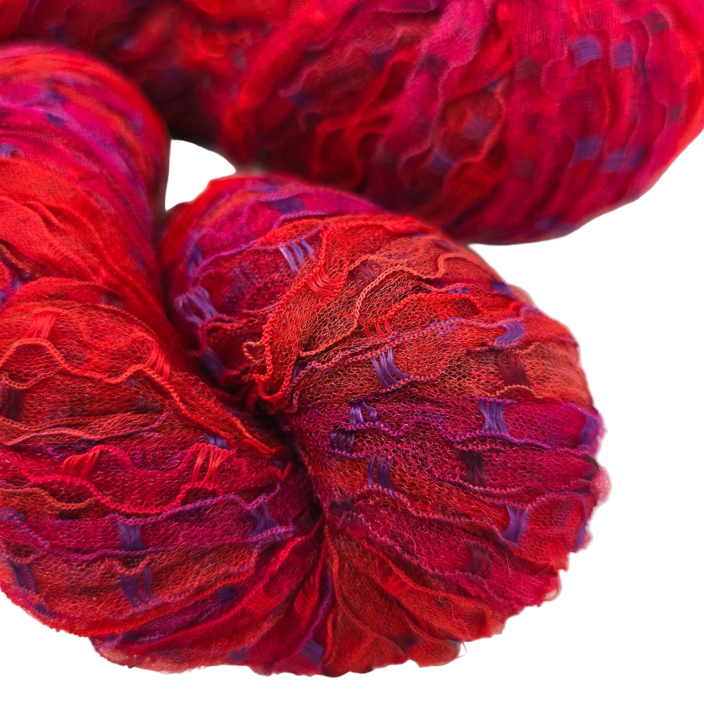 Close-up image of Dover Yarn by Prism Yarn in the color Rio Fantasy on a white background.