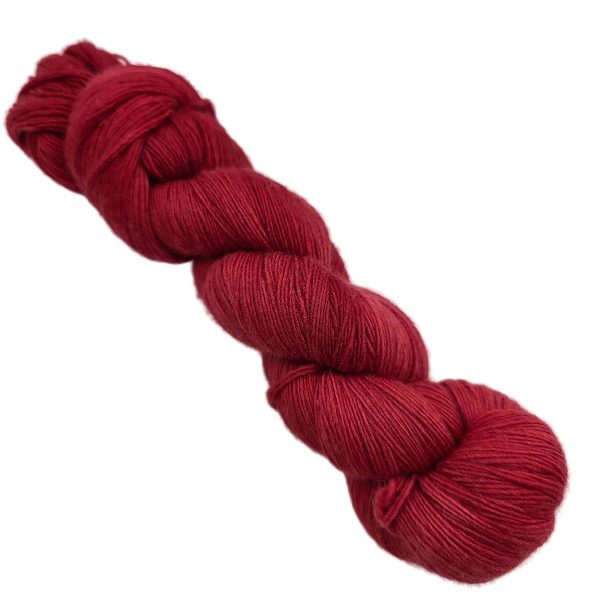 Image of single hank of Lace by Malabrigo in color 611 Ravelry Red on a white background.