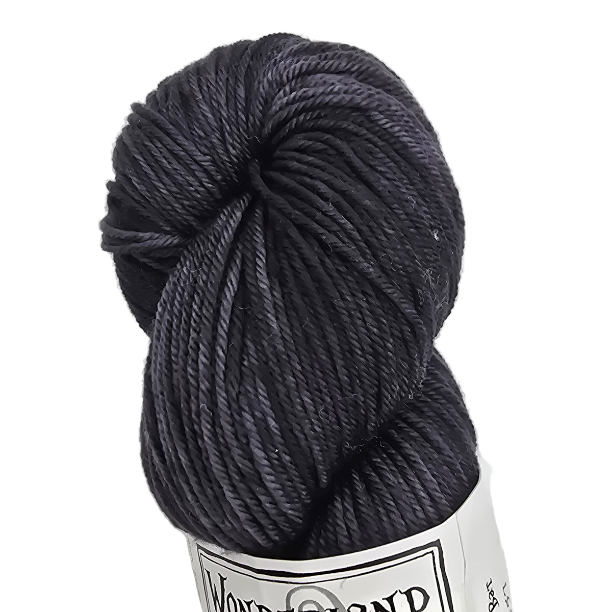 Dark gray skein of yarn with a label on a white background