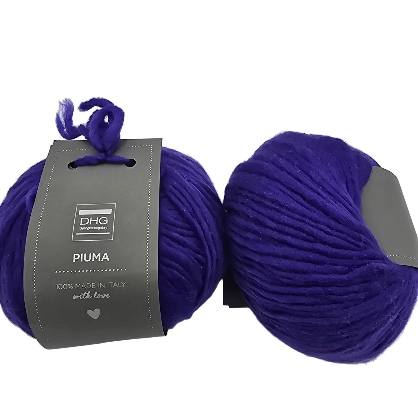 Image of two balls of Piuma by DHG Ultra Soft bulky Italian Merino Wool yarn in the color Florence which is a solid vibrant purple with labels on a white background