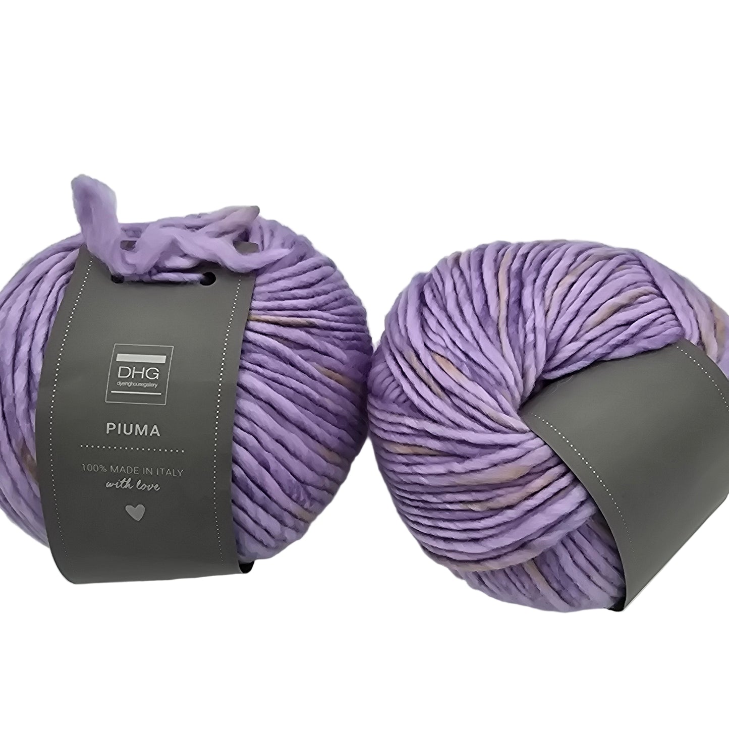 mage of two balls of Piuma by DHG Ultra Soft bulky Italian Merino Wool yarn in the color crocus which is a purple with beige areas with labels on a white background.
