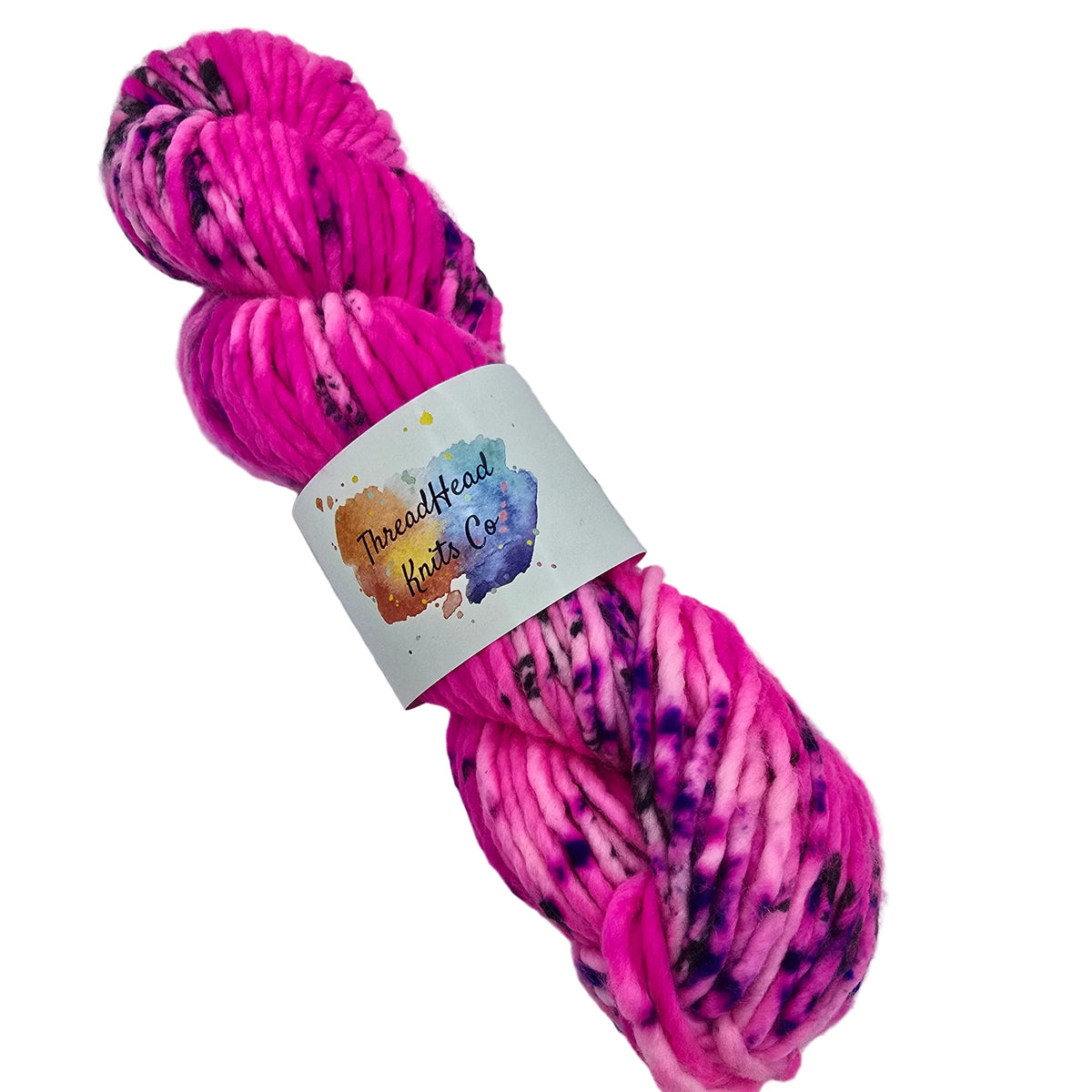 Image of a single skein of Super_Bulky_yarn by_ThreadHead_Knits_Co in the color Prom_Queen with label on a white background.