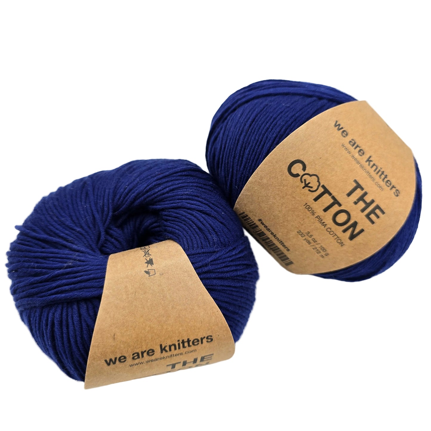 Image of two balls of The Cotton by We Are Knitters yarn in Navy Blue with labels on a white background.