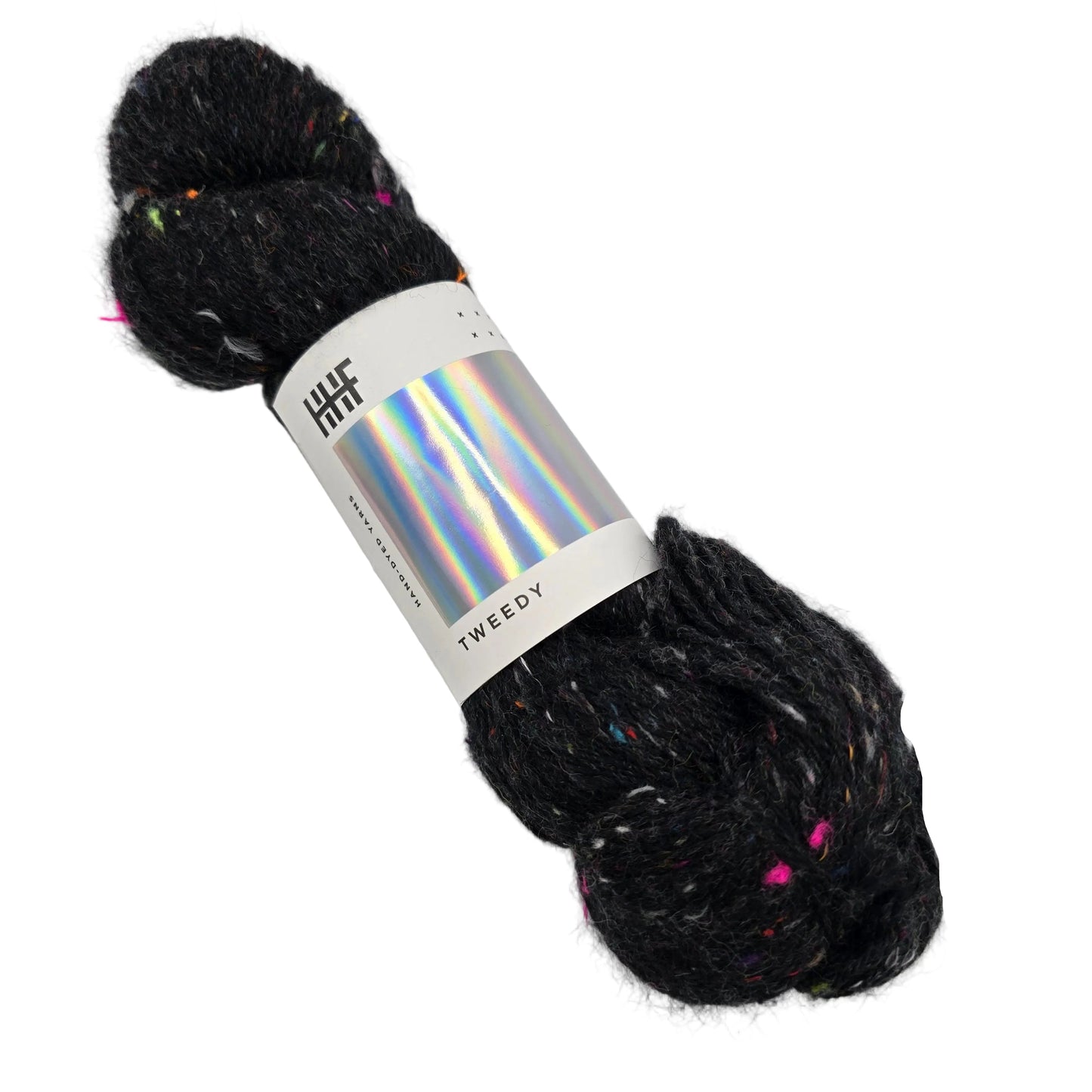 Image of a single skein of Tweedy Yarn by Hedgehog Fibres in the color noir with label on a white background.