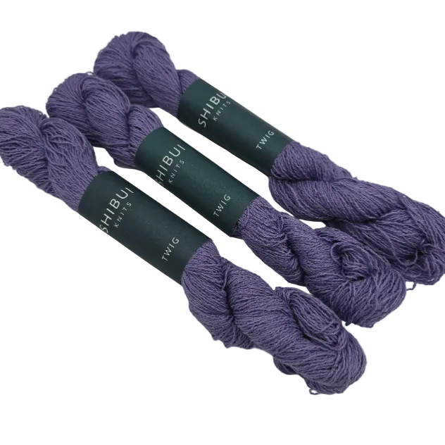 Image of 3 hanks of Twig by Shibui Knits yarn in Majesty Color 2219 with labels on a white background,