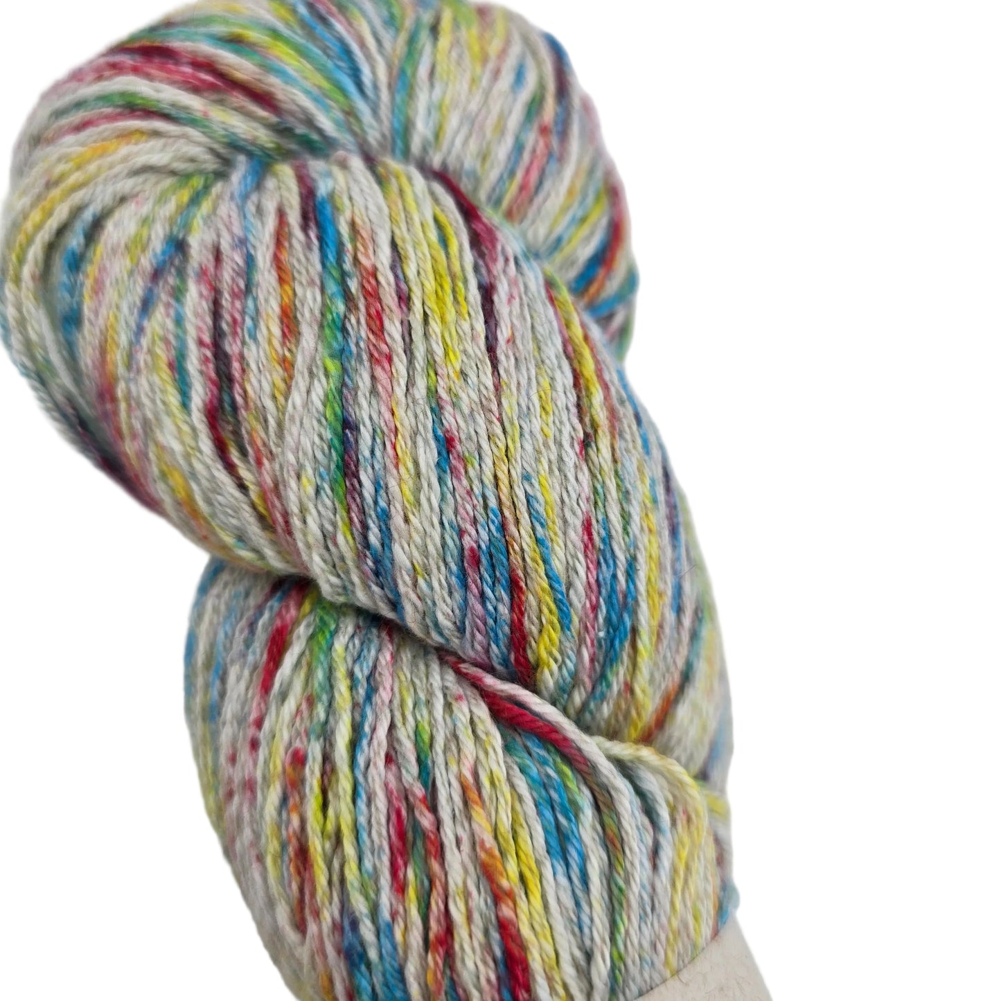 Close-up image of Cotton Sox Splash by Cascade Yarns in Color 407 on a white background.