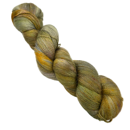 Image of a single skein of Alpaca Silk DK Yarn by Expression Fiber Arts in the color February Stillness on a white background.