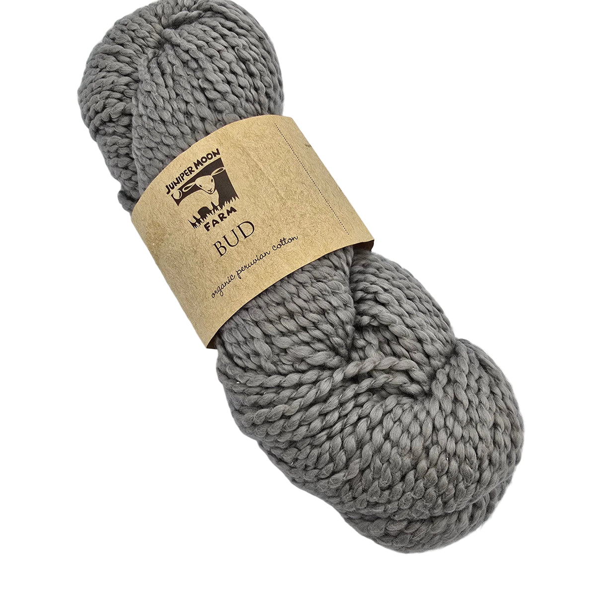 A skein of BUD_yarn by_Juniper_Moon_Farm_in_Color_101 chunky gray yarn wrapped in a kraft paper label on a white background.