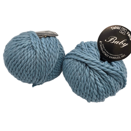 Image of two balls of Baby by Tahki yarn color 39 with labels on a white background.