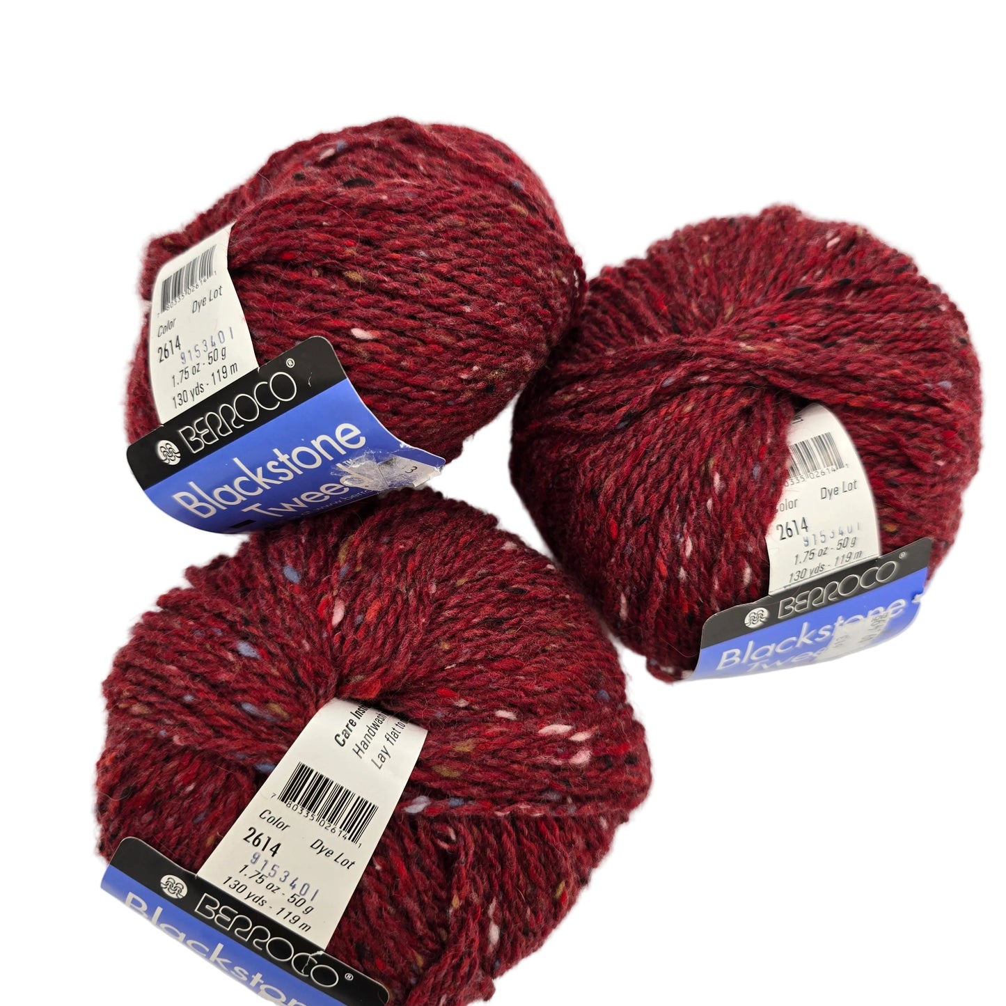 Image of three balls of Blackstone Tweed by Berroco in Color 2614 with labels on a white background.