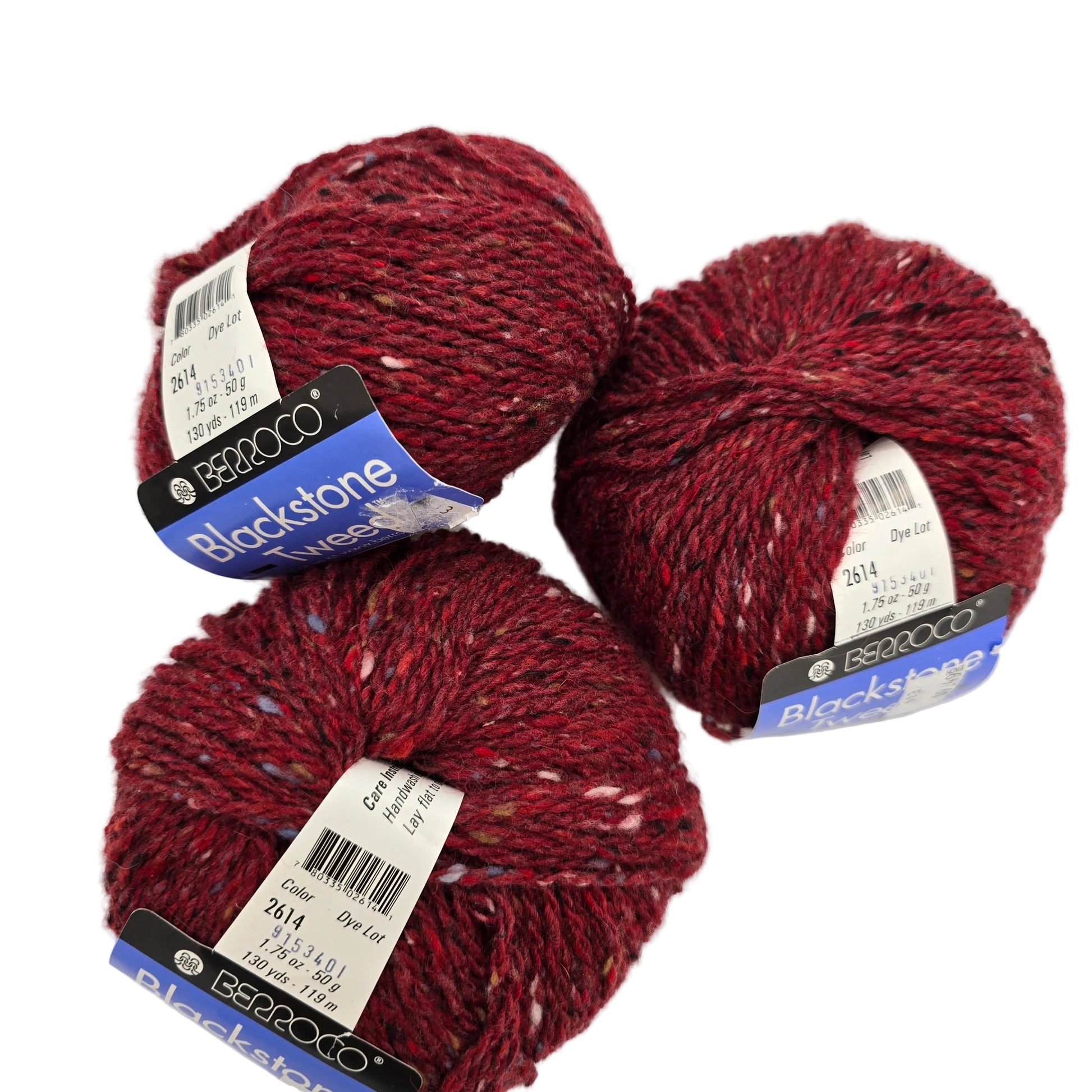 Image of three balls of Blackstone Tweed by Berroco in Color 2614 with labels on a white background.