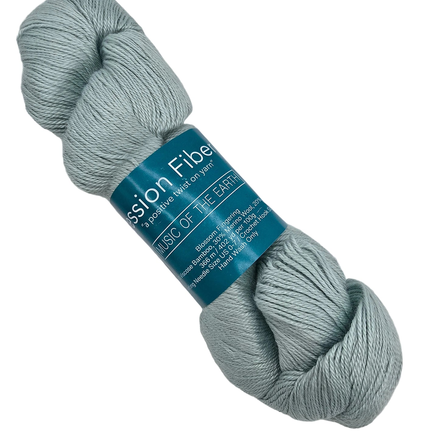 Image of single skein of Blossom_Fingering_by_Expression_Fiber_Arts_yarn in the color_Music of the earth with label on a white background.