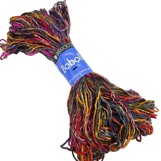 Image of single folded hank of Boboli by Berroco yarn in Color 5352 Red Multi with label on a white background.