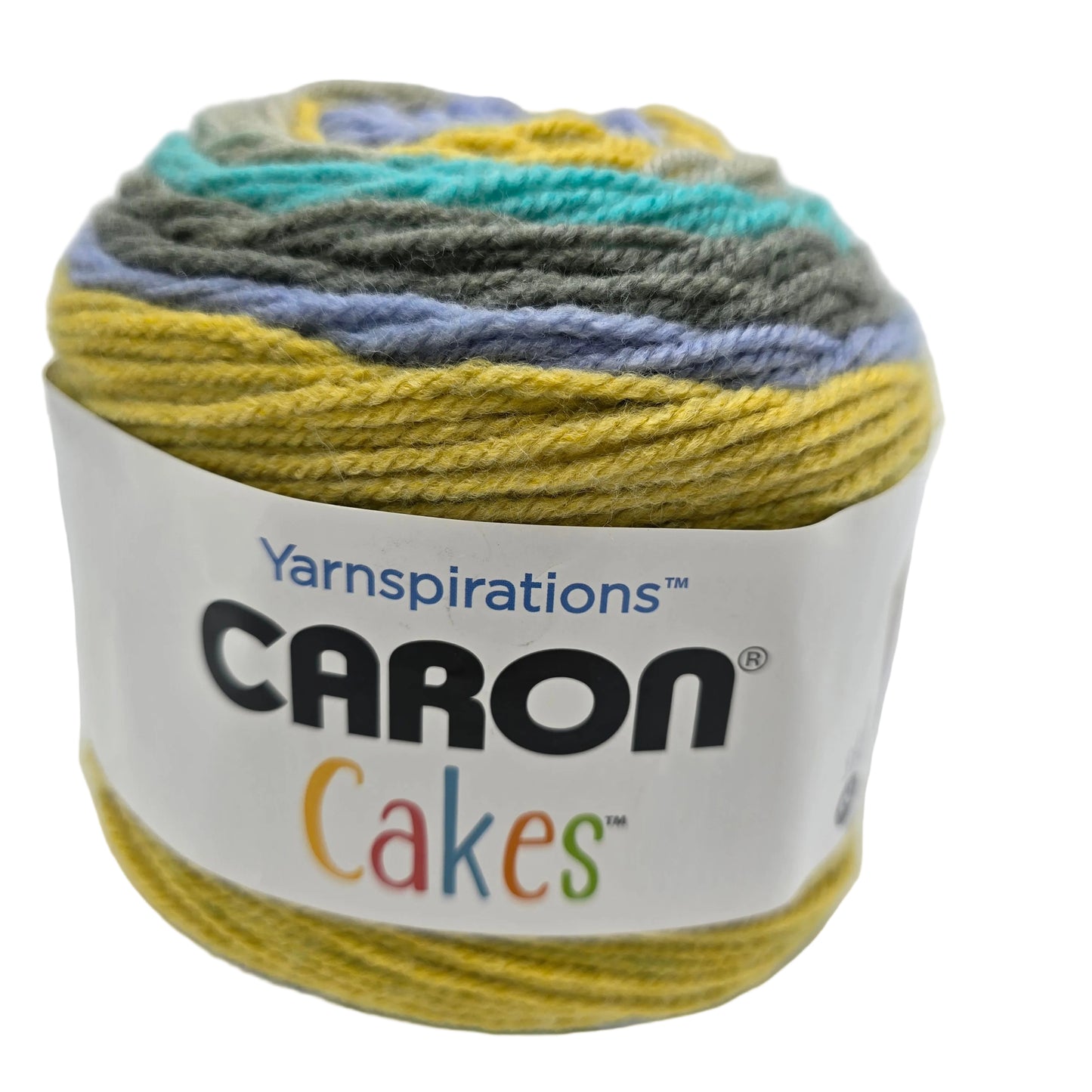Image of a single cake of Baron Cakes Yarn in the color Banana Bread with label on a white background.