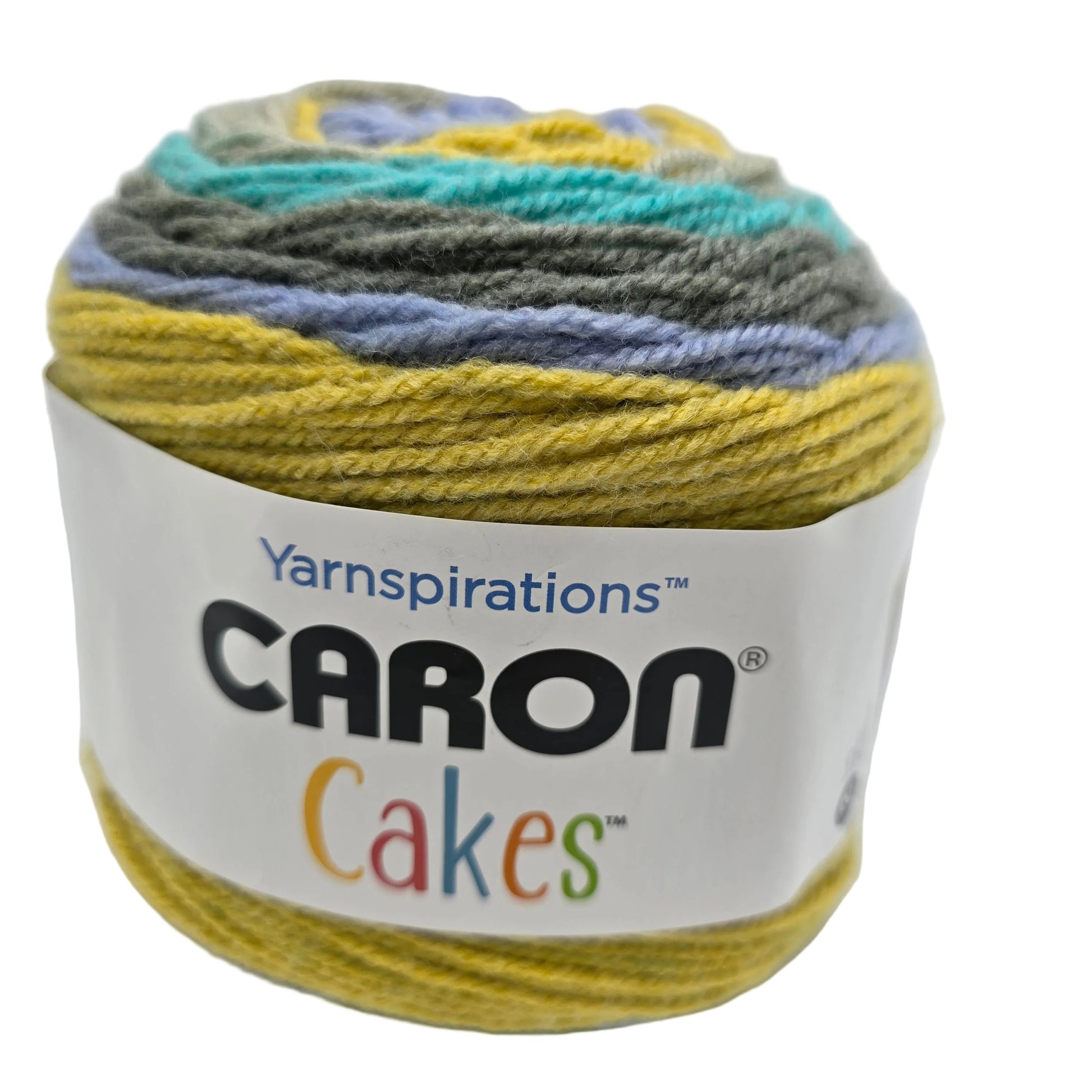 Image of a single cake of Baron Cakes Yarn in the color Banana Bread with label on a white background.