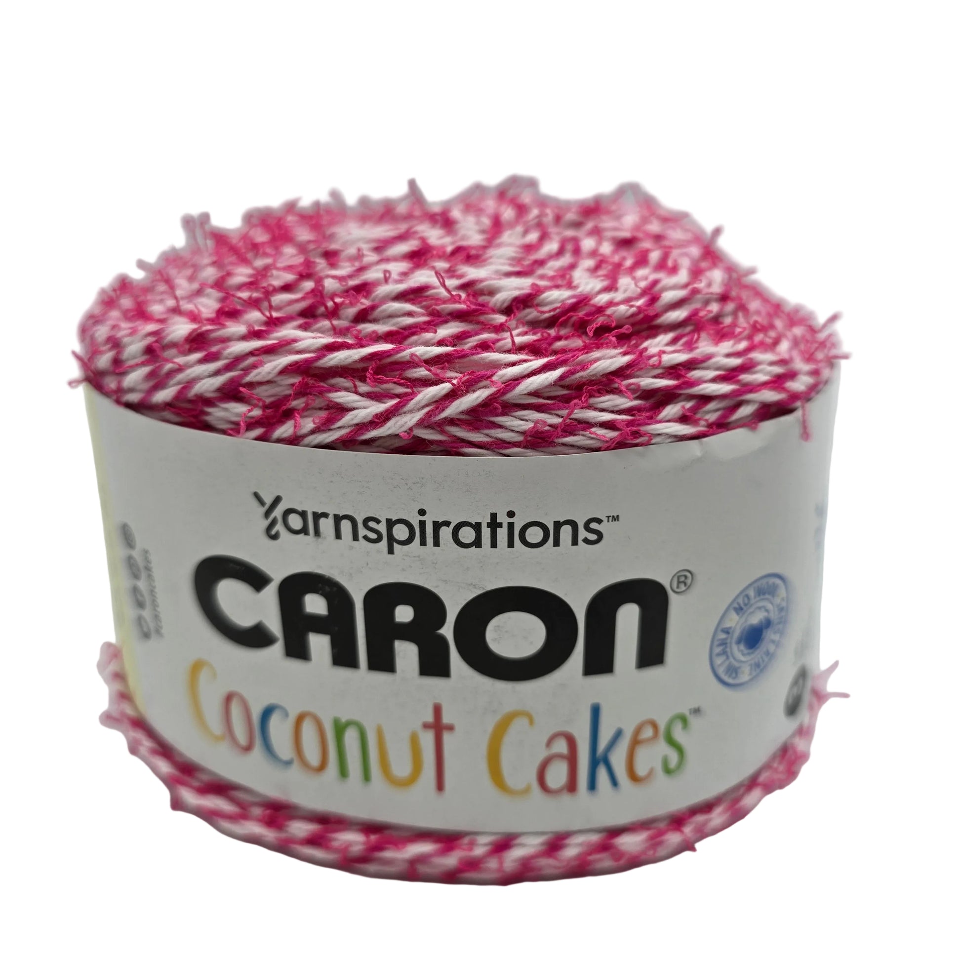 Image of a single  cake of Caron Coconut Cakes yarn in the color Fuchsia with label on a white background.