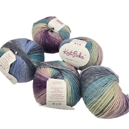 Image of 5 balls of Chroma Worsted yarn by Knit Picks in the color  Drawing room with labels on a white background.