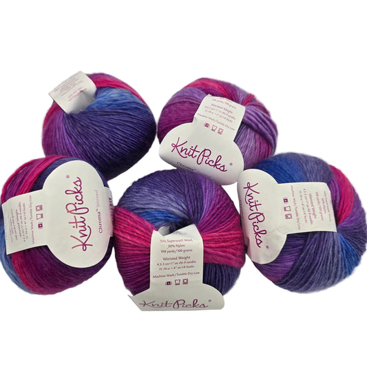 Image of 5 balls of Chroma Worsted Yarn by Knit Picks in the color Lupine with labels on a white background.