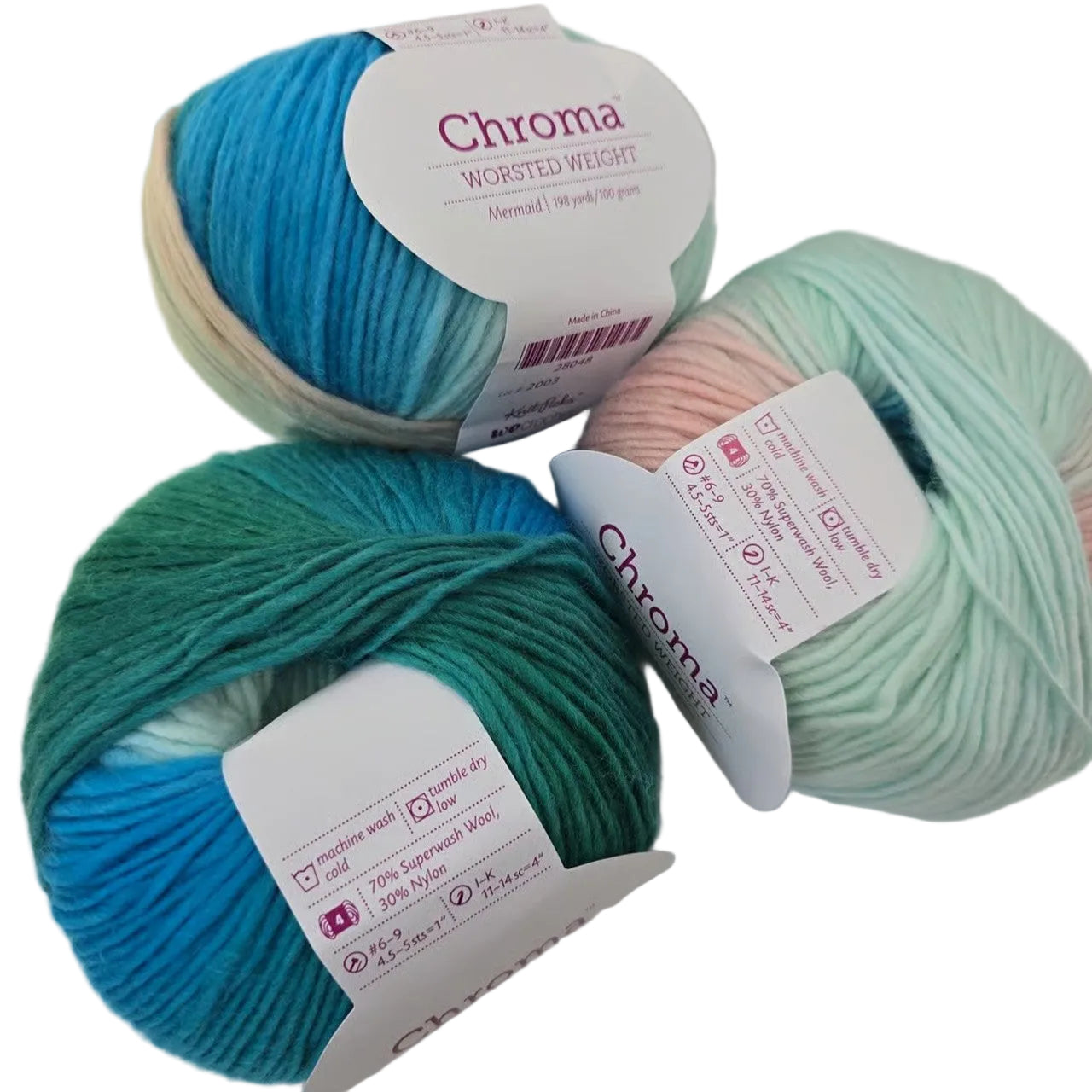 Image of 3 balls of Chroma Worsted Yarn by Knit Picks in the color Mermaid with labels on a white background.