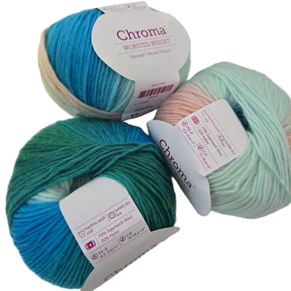 Image of 3 balls of Chroma Worsted Yarn by Knit Picks in the color Mermaid with labels on a white background.