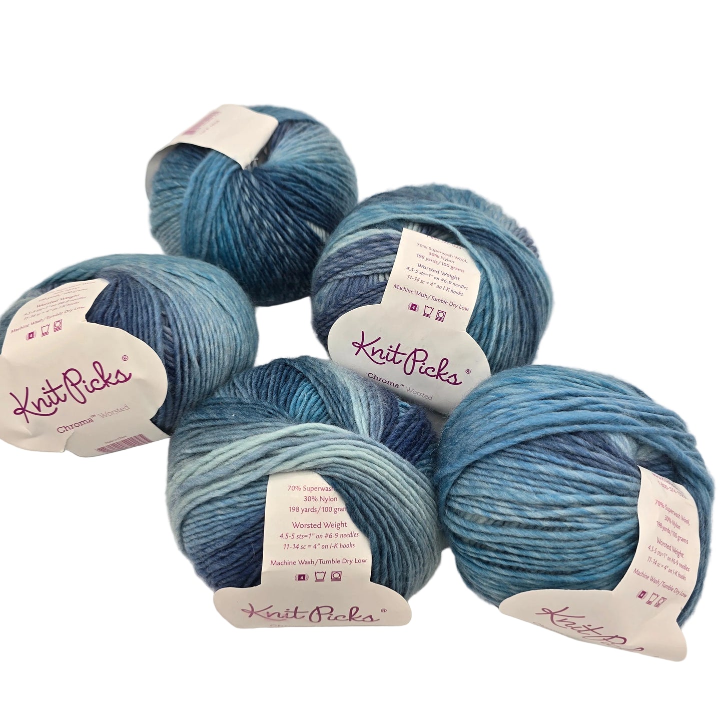 Image of 5 balls of Chroma Worsted by Knit Picks yarn in the color  Weather Vane with labels on a white background.