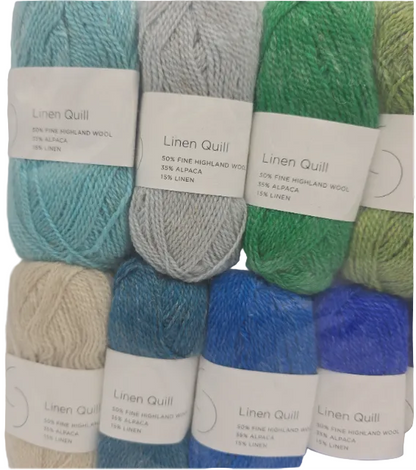 Close-up Image 1 of a set of mini skeins of Purl Soho Linen Quill Yarn Set of 10 Minis in Blue & Green colors with labels on a white background.