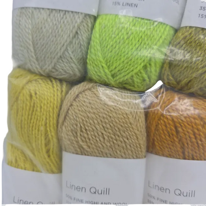 Close-up Image of a set of mini skeins of Purl Soho Linen Quill Yarn Set of 10 Minis in Citrus & Brown colors with labels on a white background.