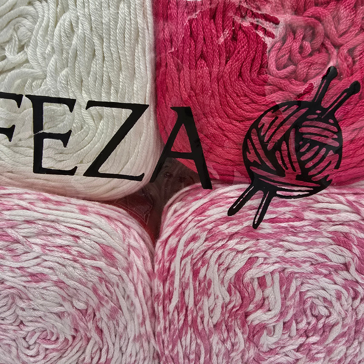 four balls of variegated yarn arranged in a square, with the brand name 'FEZA' and a knitting icon printed in black across the center. The yarn colors alternate between white, bright pink, and a pink-and-white marled pattern.