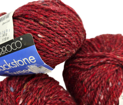 Close-up image of Blackstone Tweed Yarn by Berroco in Color 2614 with partial label on a white background.