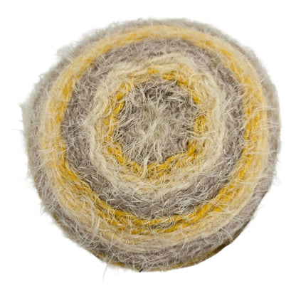 Close-up image of Caron_Latte_Cakes_Yarn_-in the color Butter_Cookie on a white background.