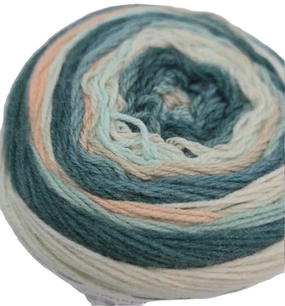 Close-up image of Caron Skinny Cakes yarn in the color Frosted Mint on a white  background.