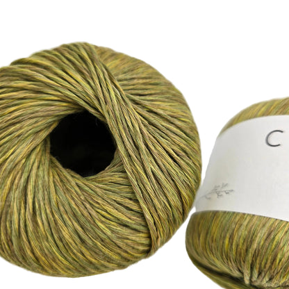 Close-up image of Lincys Concept yarn by Katia in Color 304 with partial label on a white background.