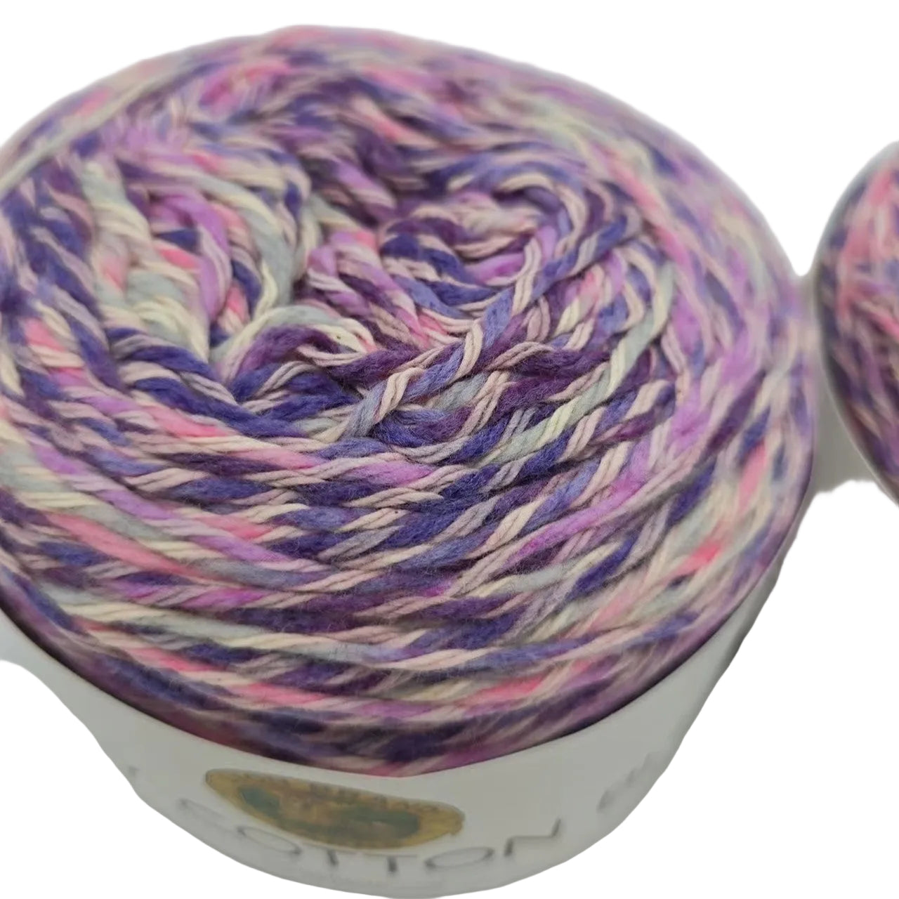 Close-up image of Lion Brand Comfy Cotton Blend  yarn in the color Soothing Lavender with a white background.
