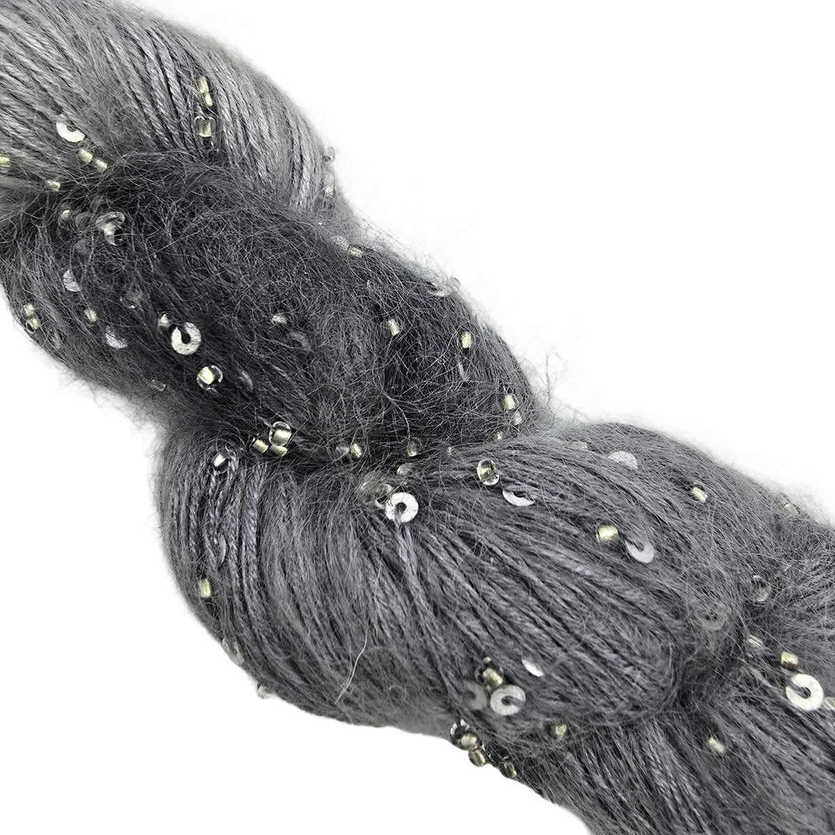 A close-up image of Mohair Splash yarn by ArtYarns  in color 148 Silver which is a gray ombre yarn with silver sequins, featuring a white paper label at the top, photographed on a white background.
