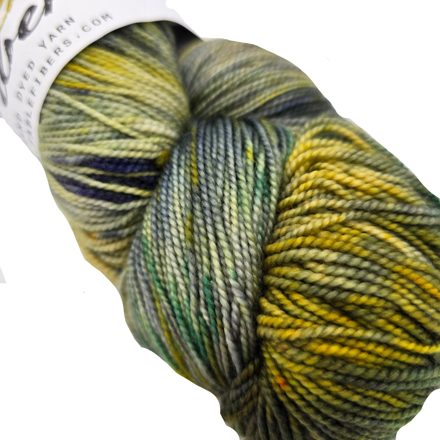 Close-up image of Novel Yarn by Fable Fibers in the color 3 French Hens on a white background.