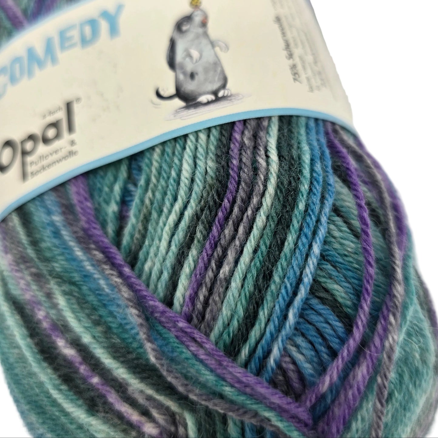 Close-up image of Opal Comedy 4-Ply sock Yarn -in Color 9835 Sketch with partial label on a white background.
