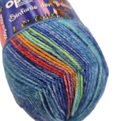 Close-up image of a single skein of Opal Sinfonie der Traume yarn in Color 9611 Wild Water with partial label on a white background.